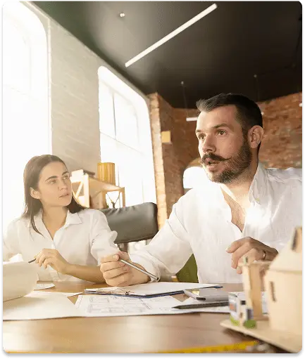 male-architect-engineer-presents-project-future-house-young-family-1